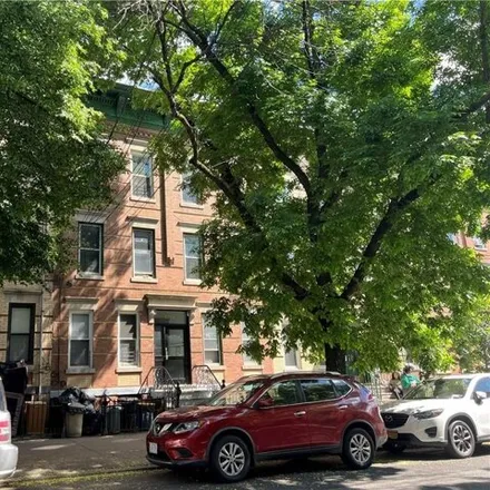 Buy this 18 bed house on 1714 Gates Avenue in New York, NY 11385