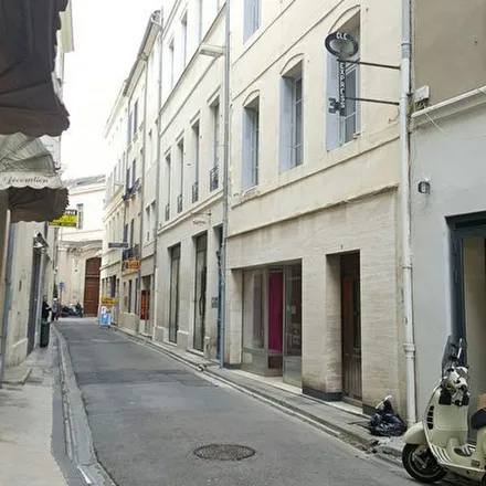 Image 2 - 1 Place des Arènes, 30000 Nîmes, France - Apartment for rent