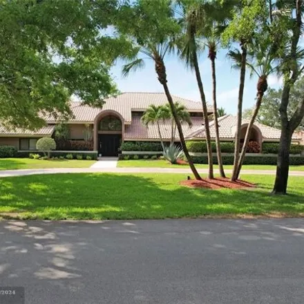 Buy this 5 bed house on 7011 Hialeah Lane in Parkland, FL 33067