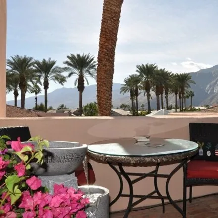 Rent this 1 bed condo on The Palm Springs Deauville in 500 East Amado Road, Palm Springs