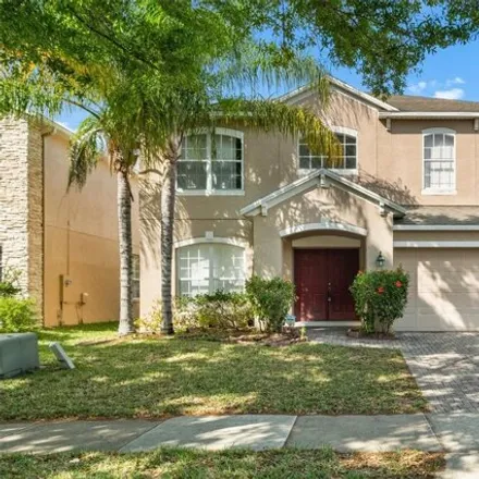 Rent this 4 bed house on 12804 Moss Park Ridge Drive in Orange County, FL 32832