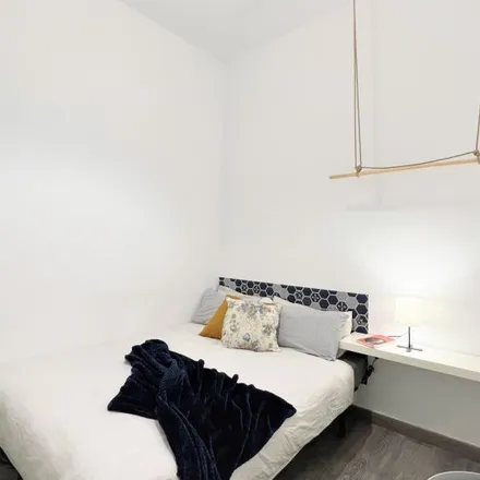 Rent this 6 bed room on Calle de Montserrat in 28015 Madrid, Spain