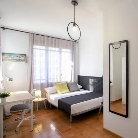 Rent this 6 bed room on Bar Jesus in Carrer d'Àngel Guimerà, 46008 Valencia