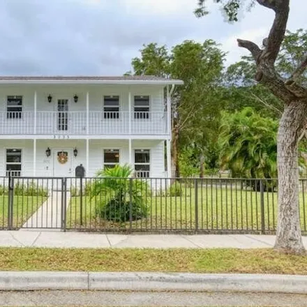 Rent this 4 bed house on 1164 Charles Street in West Palm Beach, FL 33401