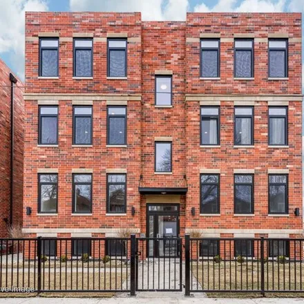 Rent this 2 bed condo on UNO Roberto Clemente Charter School in 2050 North Natchez Avenue, Chicago