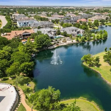 Buy this 2 bed condo on Tennyson Parkway in Plano, TX 75093