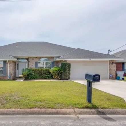 Rent this 4 bed house on 2165 Castle Grove Drive in Navarre, FL 32566