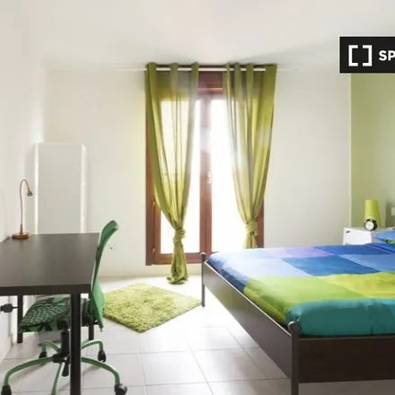 Rent this 8 bed room on Via Luigi Scrosati 9 in 20146 Milan MI, Italy