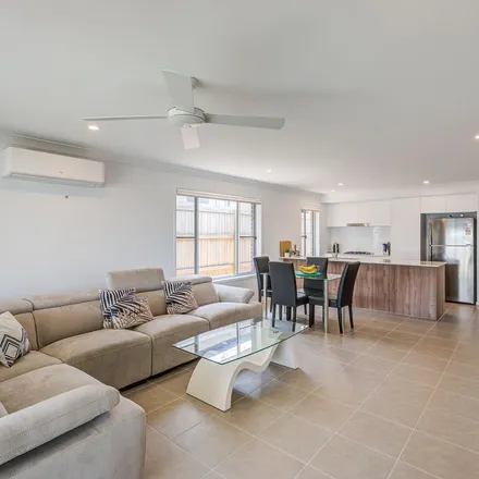 Rent this 4 bed apartment on Austin Way in Park Ridge QLD 4125, Australia