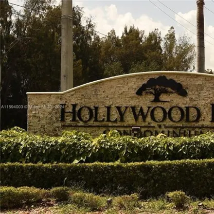 Buy this 2 bed condo on South Luna Court in Hollywood, FL 33021
