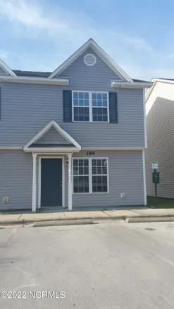 Rent this 2 bed townhouse on 180 Liberty Drive in Pinewood Downs, Jacksonville