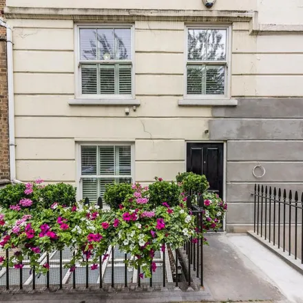 Rent this 3 bed apartment on Simmonds Pharmacy in 105 Lupus Street, London