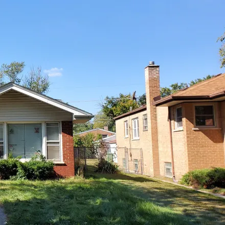 Rent this 3 bed house on 14444 Ellis Avenue in Dolton, IL 60419