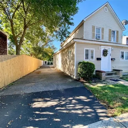 Buy this 3 bed house on 49 Railroad Avenue in Village of Amityville, NY 11701