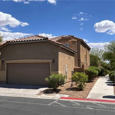 Rent this 4 bed house on 8757 Parsons Ridge Avenue in Mountain's Edge, NV 89148