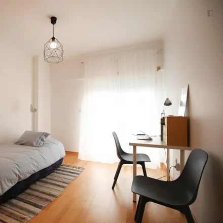 Rent this 3 bed room on Restaurante Santo António in Rua de Almada 34, 2825-450 Costa da Caparica