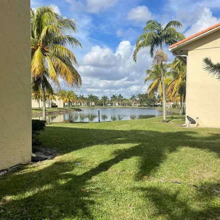 Rent this 2 bed apartment on 1545 Lake Crystal Drive in Golden Lakes, Palm Beach County