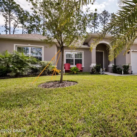 Buy this 3 bed house on Grand Club Cypress Course in Evanston Place, Palm Coast