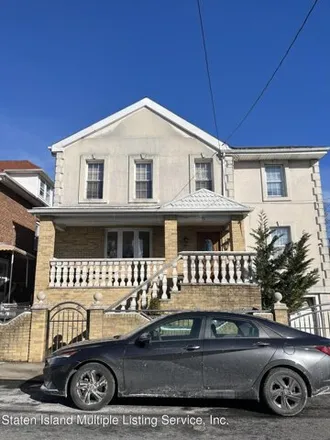 Buy this 5 bed house on 71 Windom Avenue in New York, NY 10305