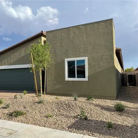 Rent this 4 bed house on Devlin Drive in Clark County, NV 89191