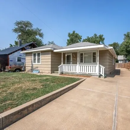 Buy this 3 bed house on 1404 Pershing St in Salina, Kansas