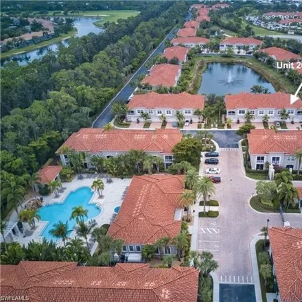 Buy this 3 bed condo on 8597 Violeta Street in Mirasol at Coconut Point, Lee County