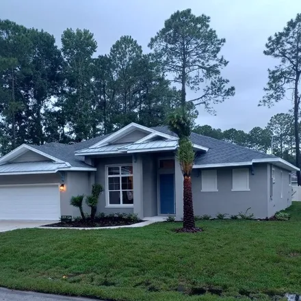 Buy this 3 bed house on 11 Woodstone Lane in Palm Coast, FL 32164