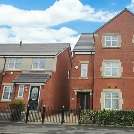 Buy this 4 bed townhouse on Chew Moor Lane in Westhoughton, BL5 3JU