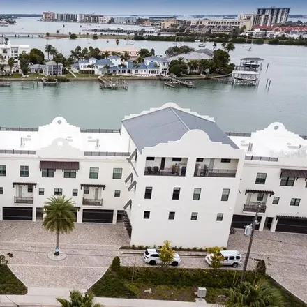 Rent this 3 bed townhouse on Sea Pines Apartment Motel in 134 Brightwater Drive, Clearwater Beach