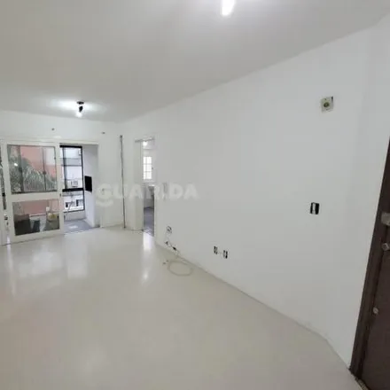 Rent this 3 bed apartment on Rua Aldo Wildt in Vila Nova, Porto Alegre - RS