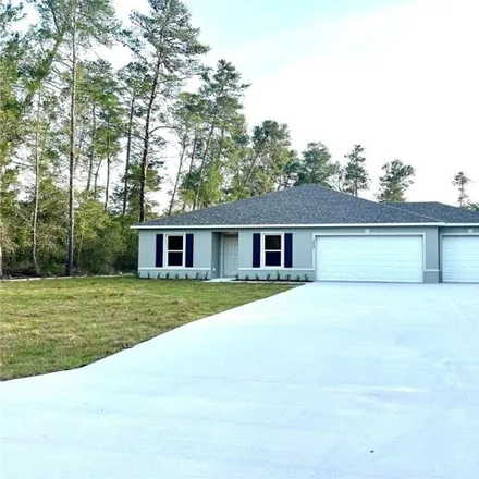 Rent this 4 bed house on 3356 Southwest 165th Loop in Marion County, FL 34473