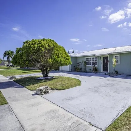 Buy this 3 bed house on 870 Hibiscus Drive in Royal Palm Beach, Palm Beach County