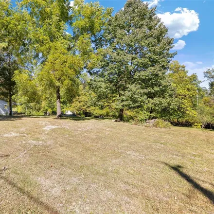 Buy this studio house on 501 Hickory Dale Drive in Harvester, MO 63304