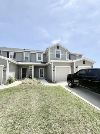 Rent this 3 bed townhouse on Silver Fern Drive in Saint Augustine, FL 32086