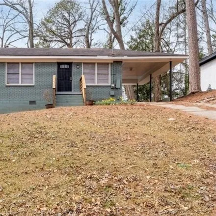 Rent this 3 bed house on 2907 Gresham Road Southeast in Panthersville, GA 30316