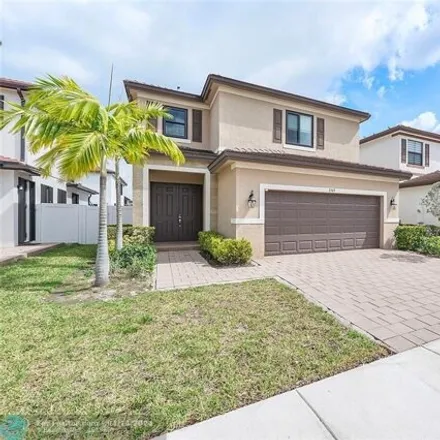 Buy this 3 bed house on West 105th Place in Hialeah, FL 33018