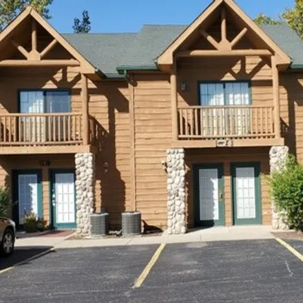 Rent this 2 bed house on Grizzly Jacks Grand Bear Resort in East 8th Road, North Utica