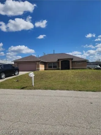 Buy this 3 bed house on 2055 Northeast 23rd Place in Cape Coral, FL 33909