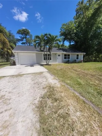 Rent this 5 bed house on 12151 68th Street North in Palm Beach County, FL 33412