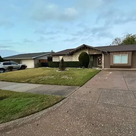 Rent this 3 bed house on 1803 Redbud Circle in Carrollton, TX 75006