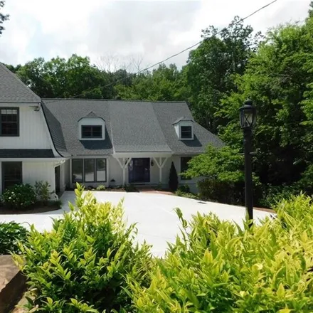 Buy this 5 bed house on 8997 Huntcliff Lake Court Northeast in Sandy Springs, GA 30350