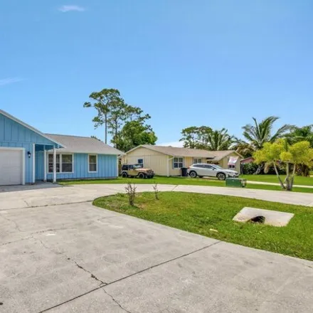 Buy this 3 bed house on 8280 Se Sweetbay Ave in Hobe Sound, Florida