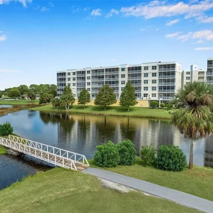 Buy this 3 bed condo on East Bay Golf Club in 702 Country Club Drive, Largo