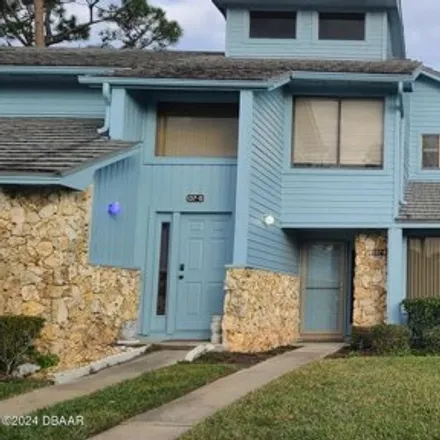 Rent this 3 bed condo on 105 Blue Heron Drive in Daytona Beach, FL 32119