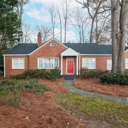 Buy this 4 bed house on 1908 Woodsdale Road Northeast in Brookhaven, GA 30324