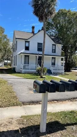Buy this 8 bed house on 205 South Grove Street in Eustis, FL 32726