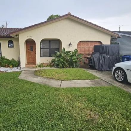 Rent this 2 bed house on 6090 Kendrick Street in North Palm Beach Heights, Jupiter