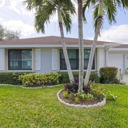 Buy this 2 bed house on 9701 Pecan Tree Drive in Palm Beach County, FL 33436