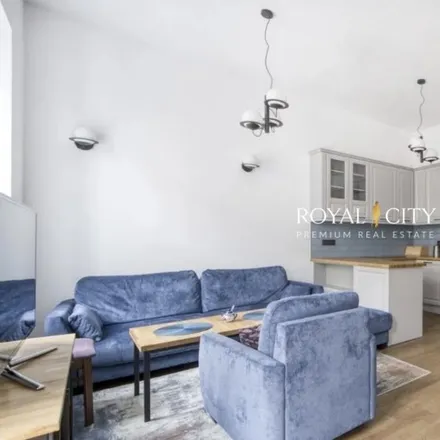 Buy this 4 bed apartment on Rondo Romana Dmowskiego in 00-693 Warsaw, Poland