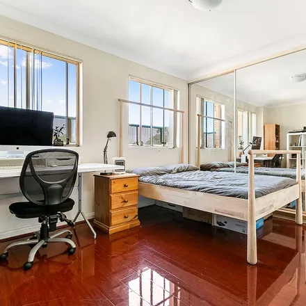 Rent this 3 bed apartment on BWS in Parramatta Road, Ashfield NSW 2131